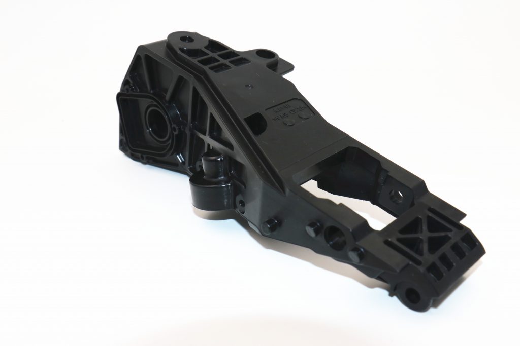 Various automotive injection molded parts showcasing precision engineering and high-quality manufacturing
