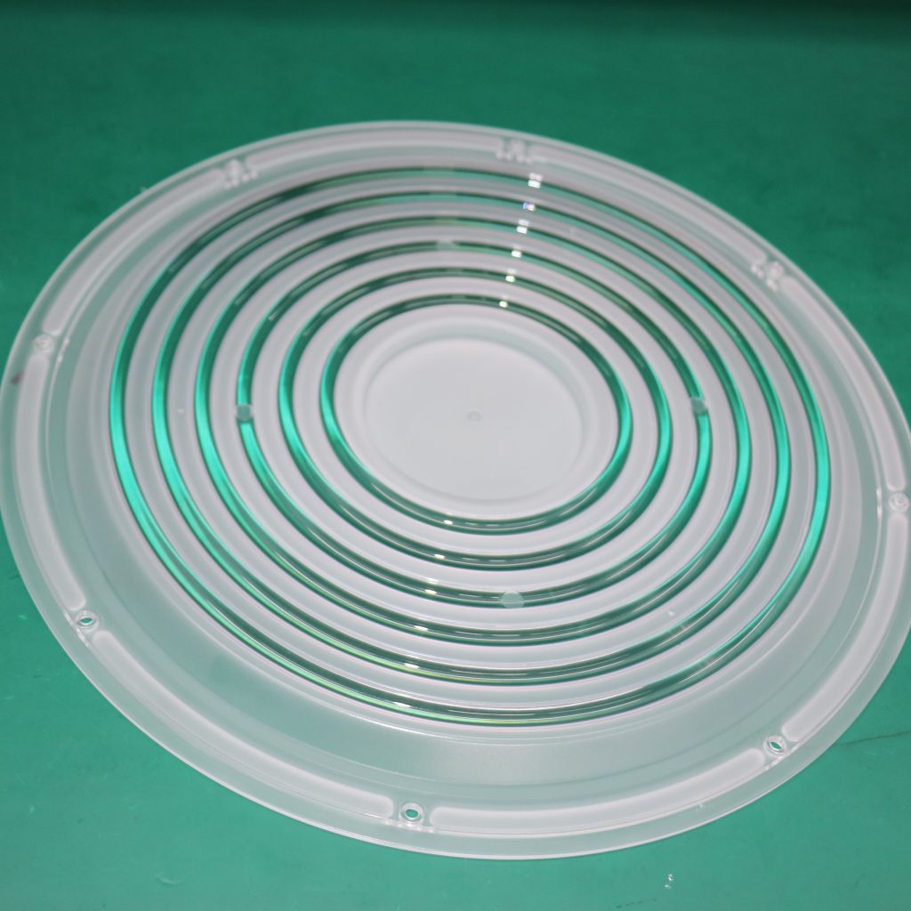 PC LED lens parts featuring precision plastic mold and polished clear surfaces.
